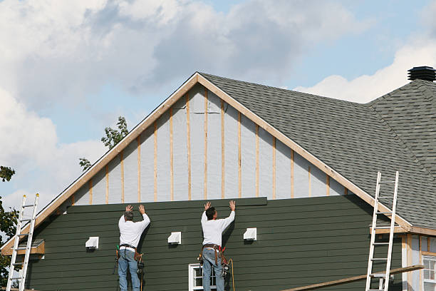 Professional Storm Damage Siding Repair technician working in Biglerville, PA